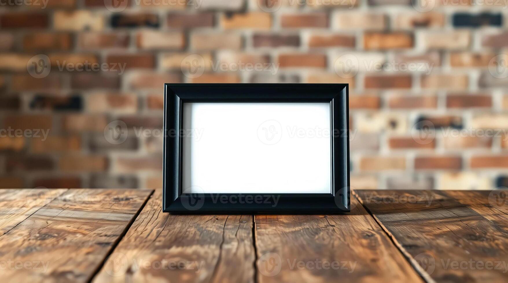 A black square frame on a wooden table photo