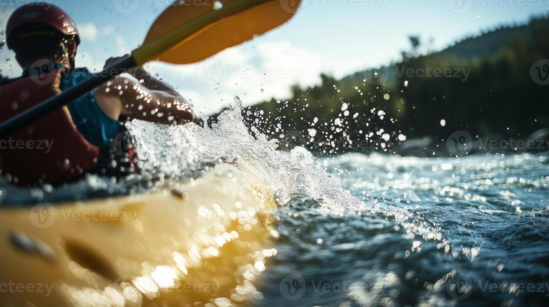 A person paddling a kayak through the water photo