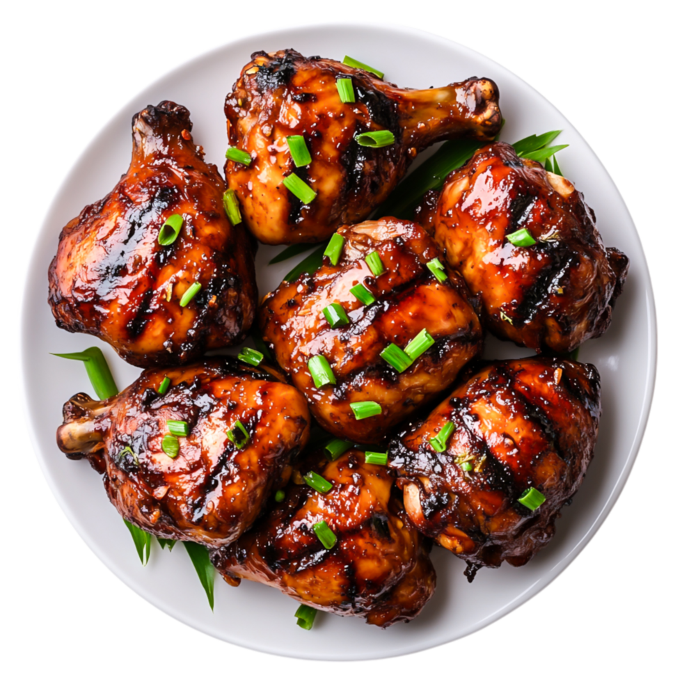 Grilled Chicken Drumsticks with Glaze and Fresh Green Garnish png