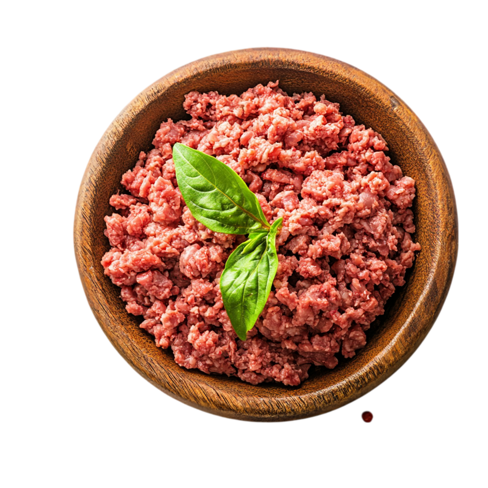Ground meat in wooden bowl with basil leaf garnish view isolated on transparent background png