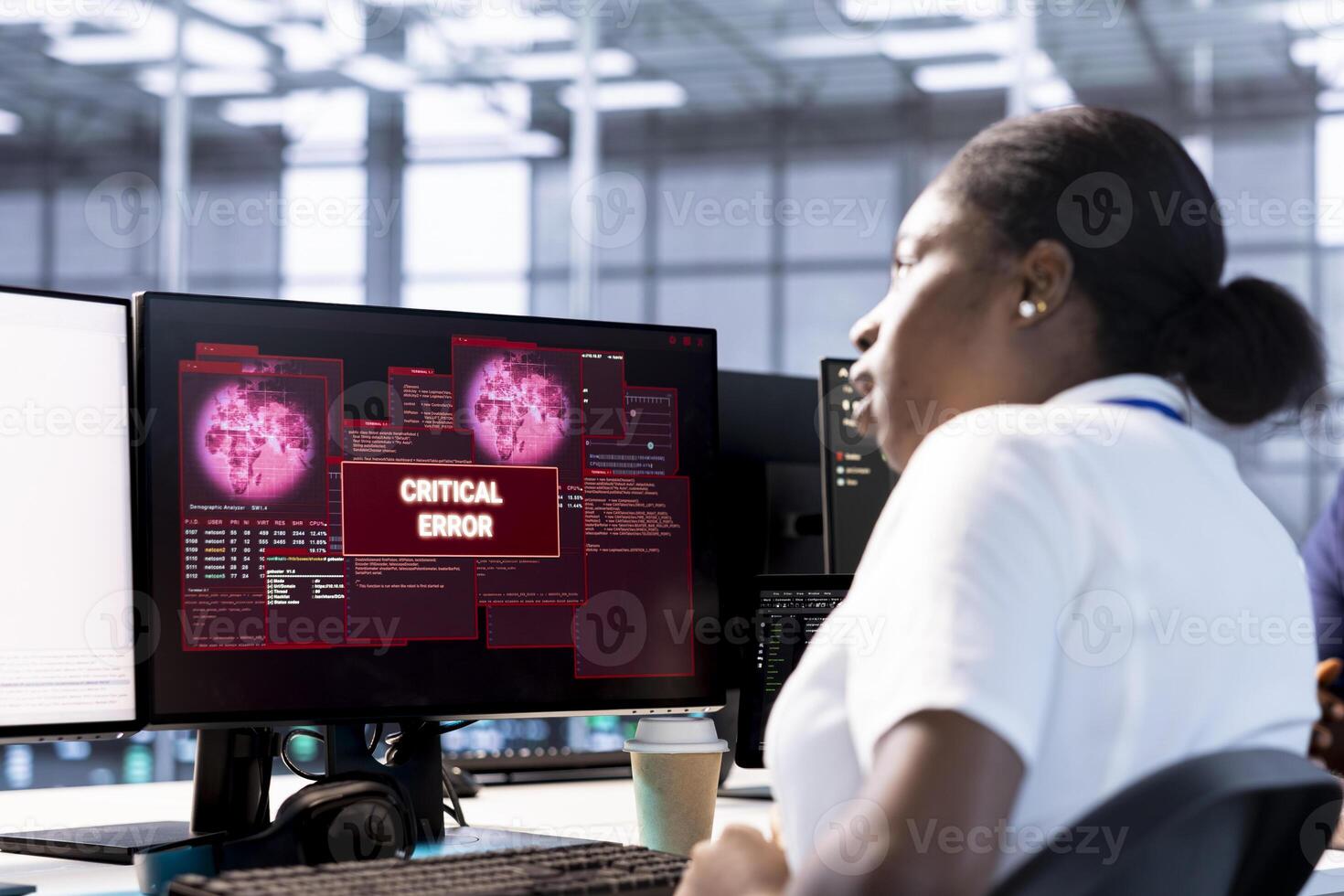 Engineer in server hub investigating breach alerts, working to protect equipment from hacker. Woman in data center employing various tools and technologies to identify and mitigate security risks photo