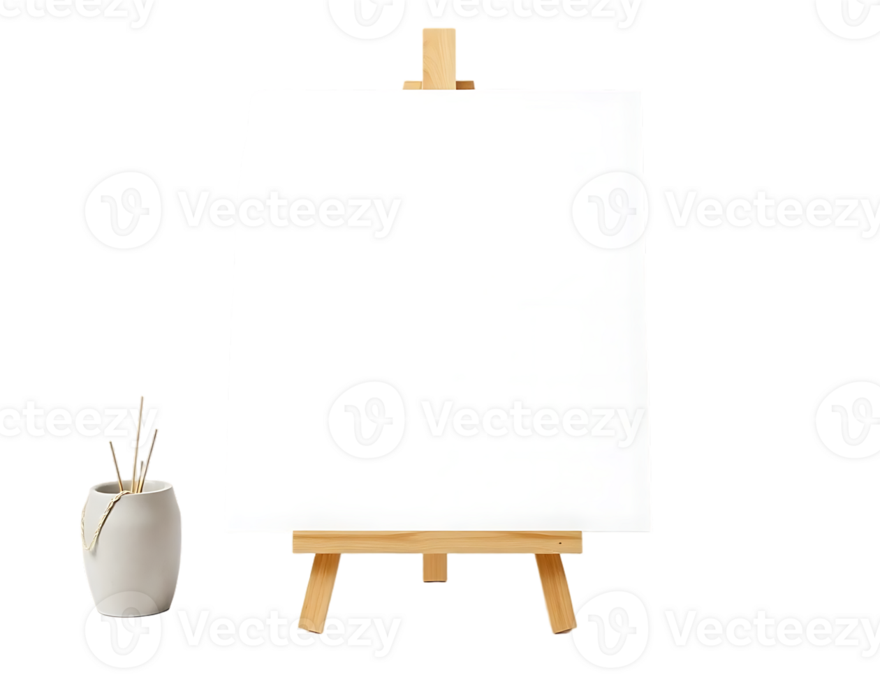 Blank canvas on a wooden easel with art supplies png