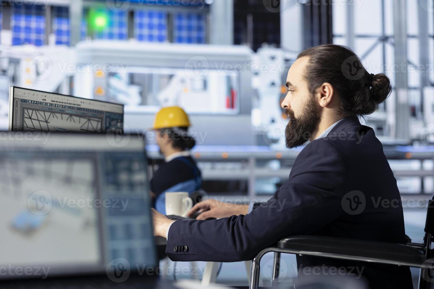 Photovoltaics factory engineer looking at PC screen, adjusting system parameters. Technician optimizing energy supply in solar panel manufacturing plant using computer monitor photo