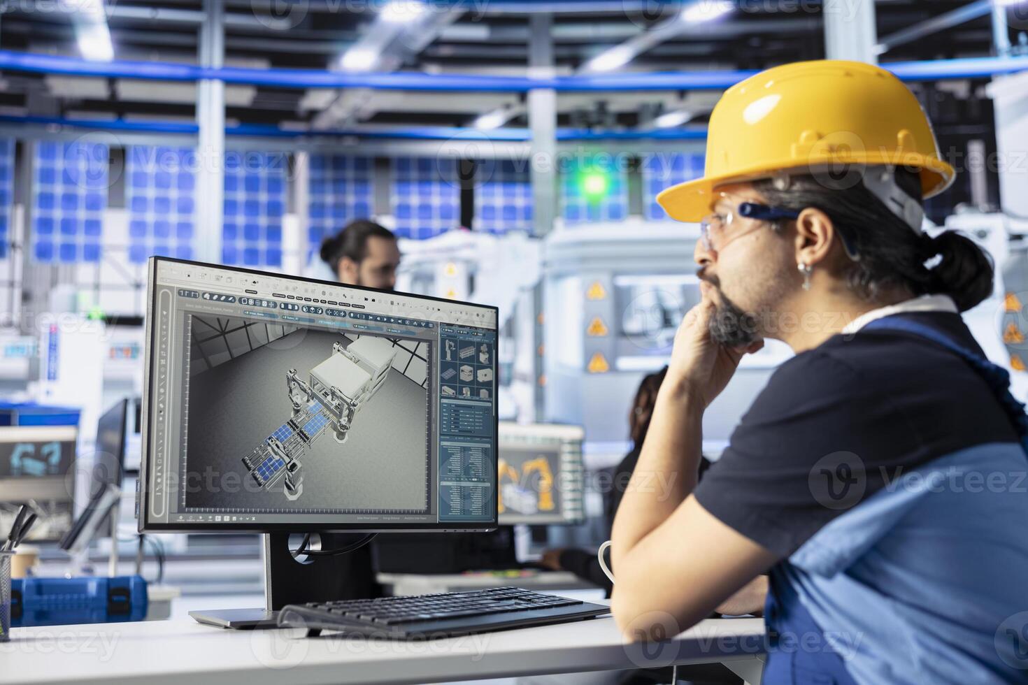 Technical engineer using computer to monitor solar panel assembly line in high tech factory Professional troubleshooting photovoltaic equipment, ensuring seamless production workflow photo
