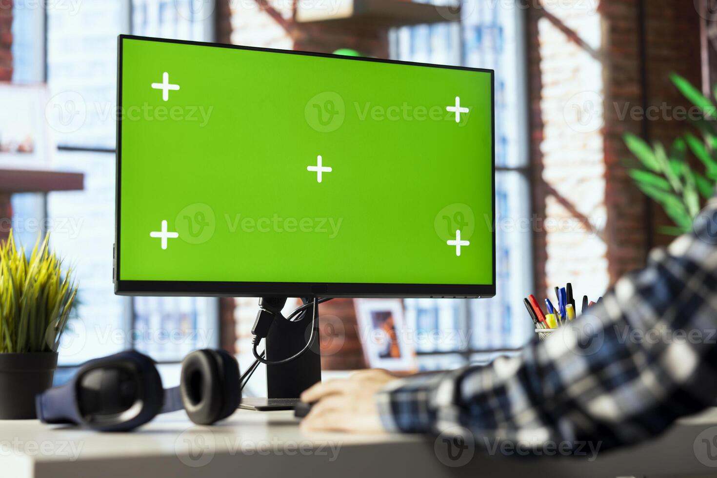Teleworker in living room office using green screen PC to answer emails from business associates. Close up of remote worker typing on mockup device keyboard, solving tasks in apartment photo