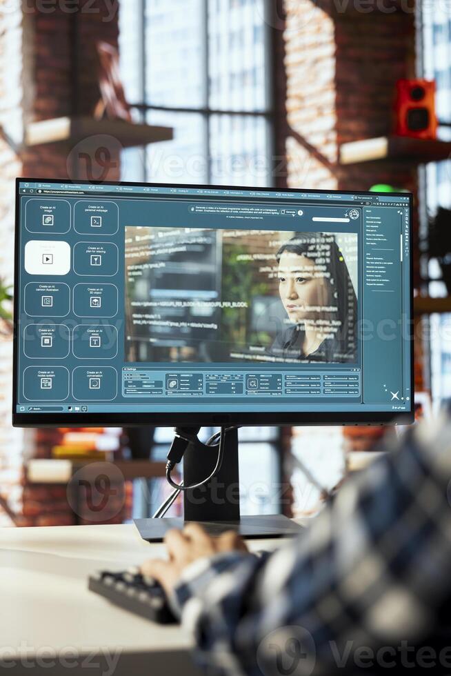 Graphic editor designing user interface for AI software turning text prompt into photos. Close up of man in home office designing text to image models using machine learning tech photo