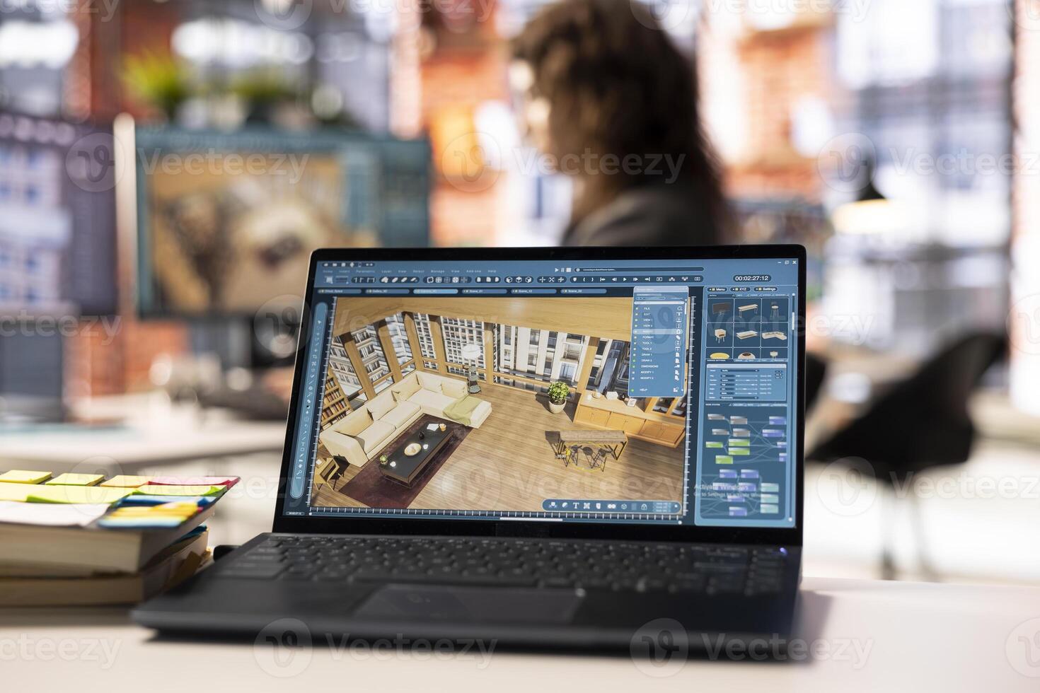 Architectural designer works on a digital home design project, using a 3D modeling program to arrange furniture. The software with advanced user interface for professional rendering. photo