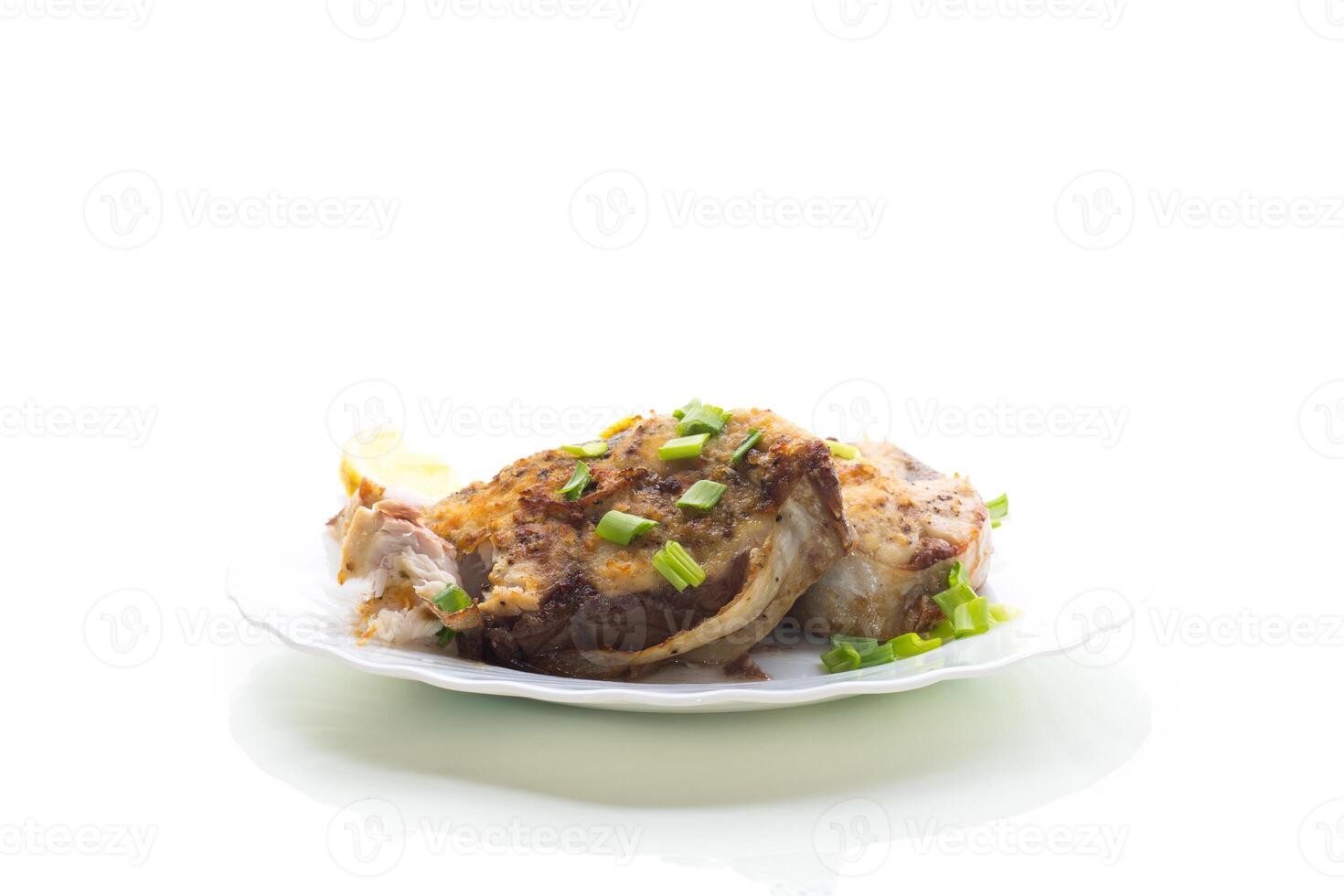 Gourmet dinner with juicy fish, isolated on white background photo