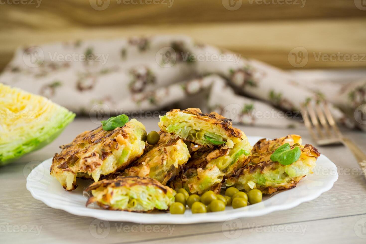Quick and easy breakfast.vegetable cutlets from early cabbage with peas photo
