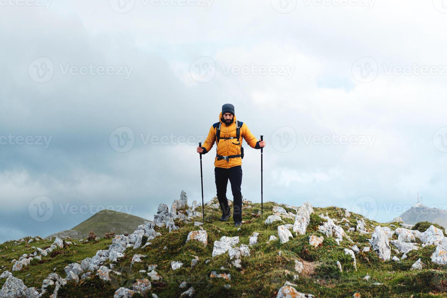 mountaineers hiking in the mountains with breathtaking views photo