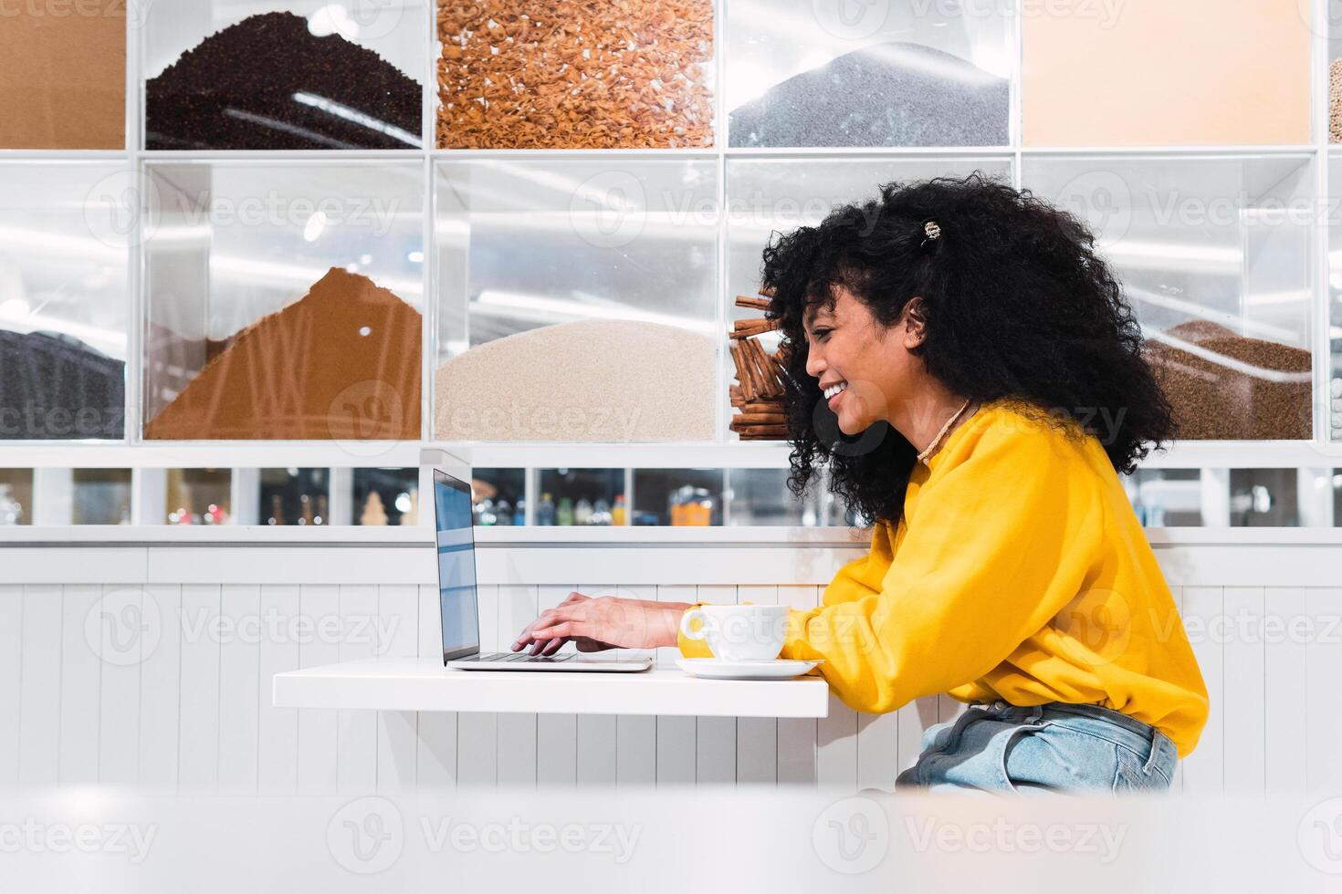 Black woman working on laptop photo