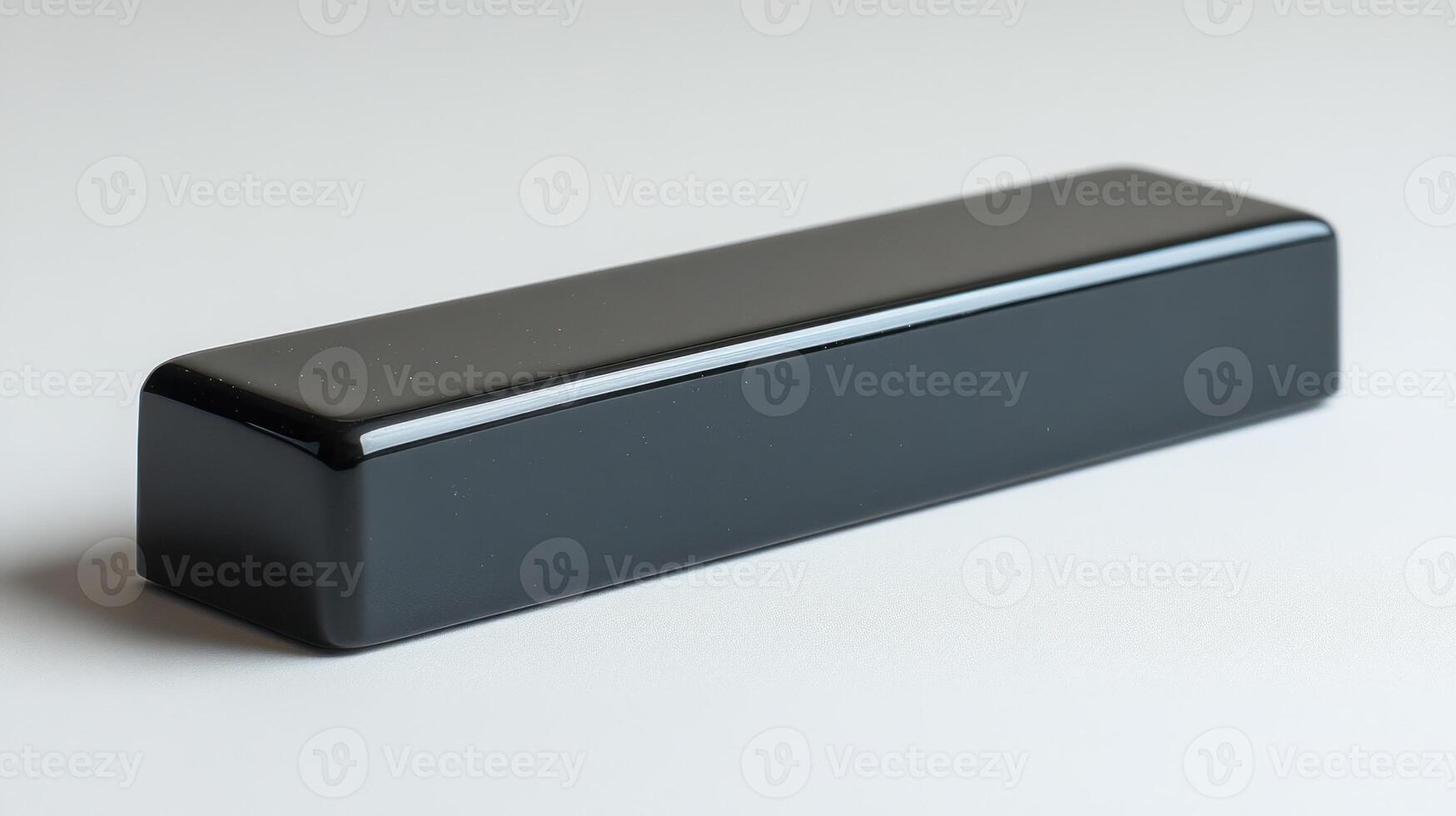 Black rectangular object on white background. photo