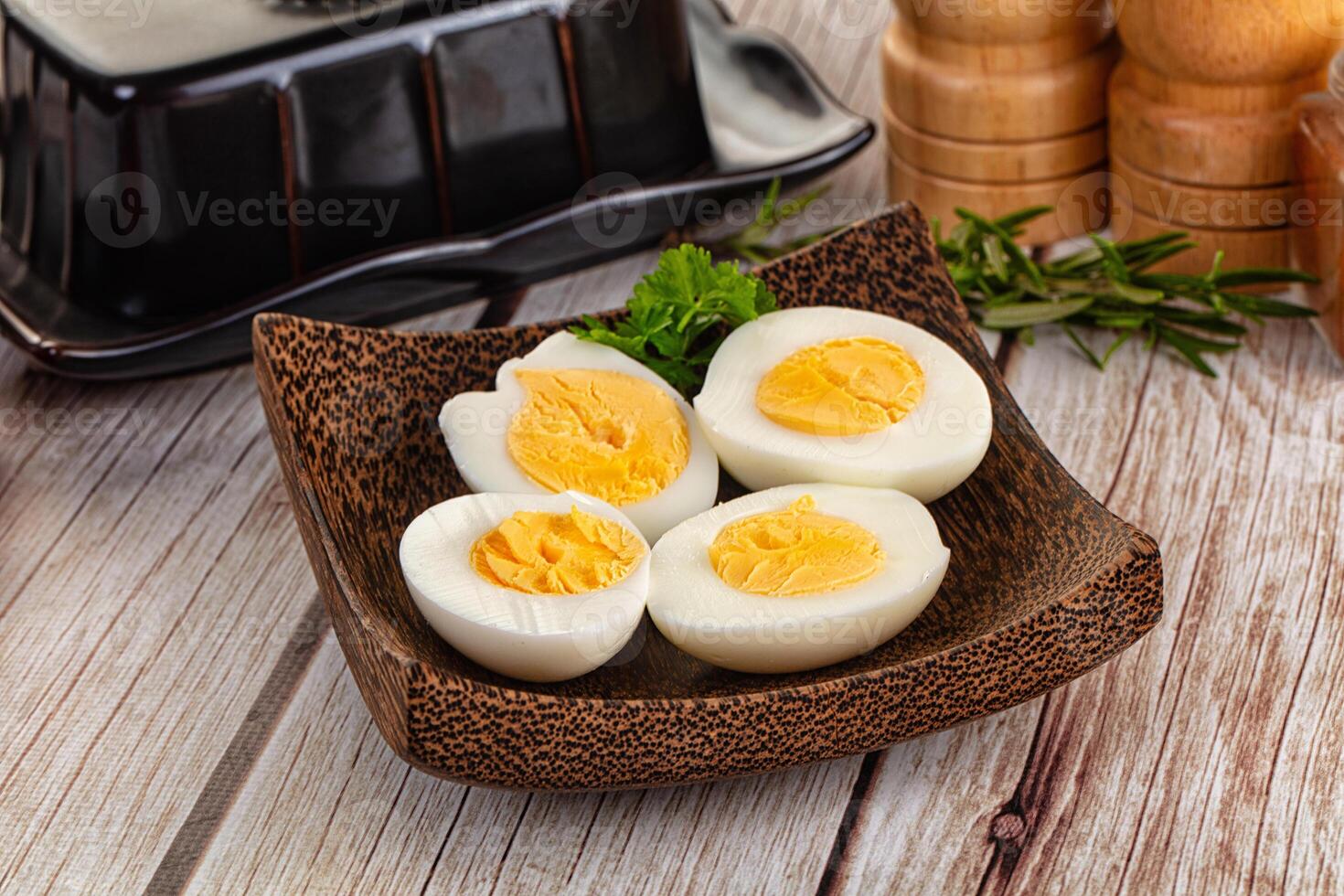A bowl of boiled eggs on a table photo