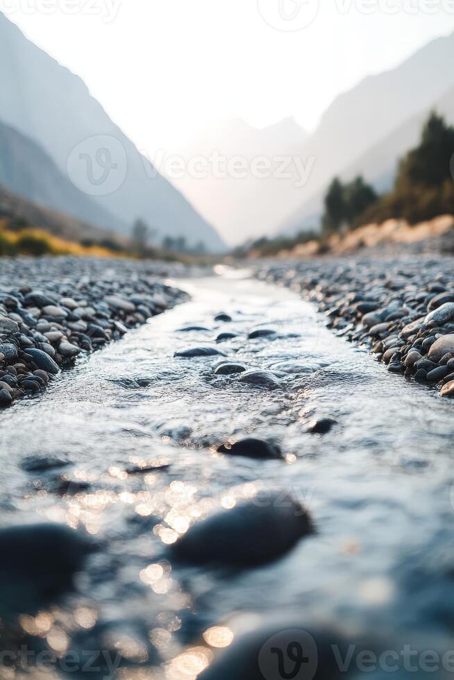A stream running through a rocky river bed photo