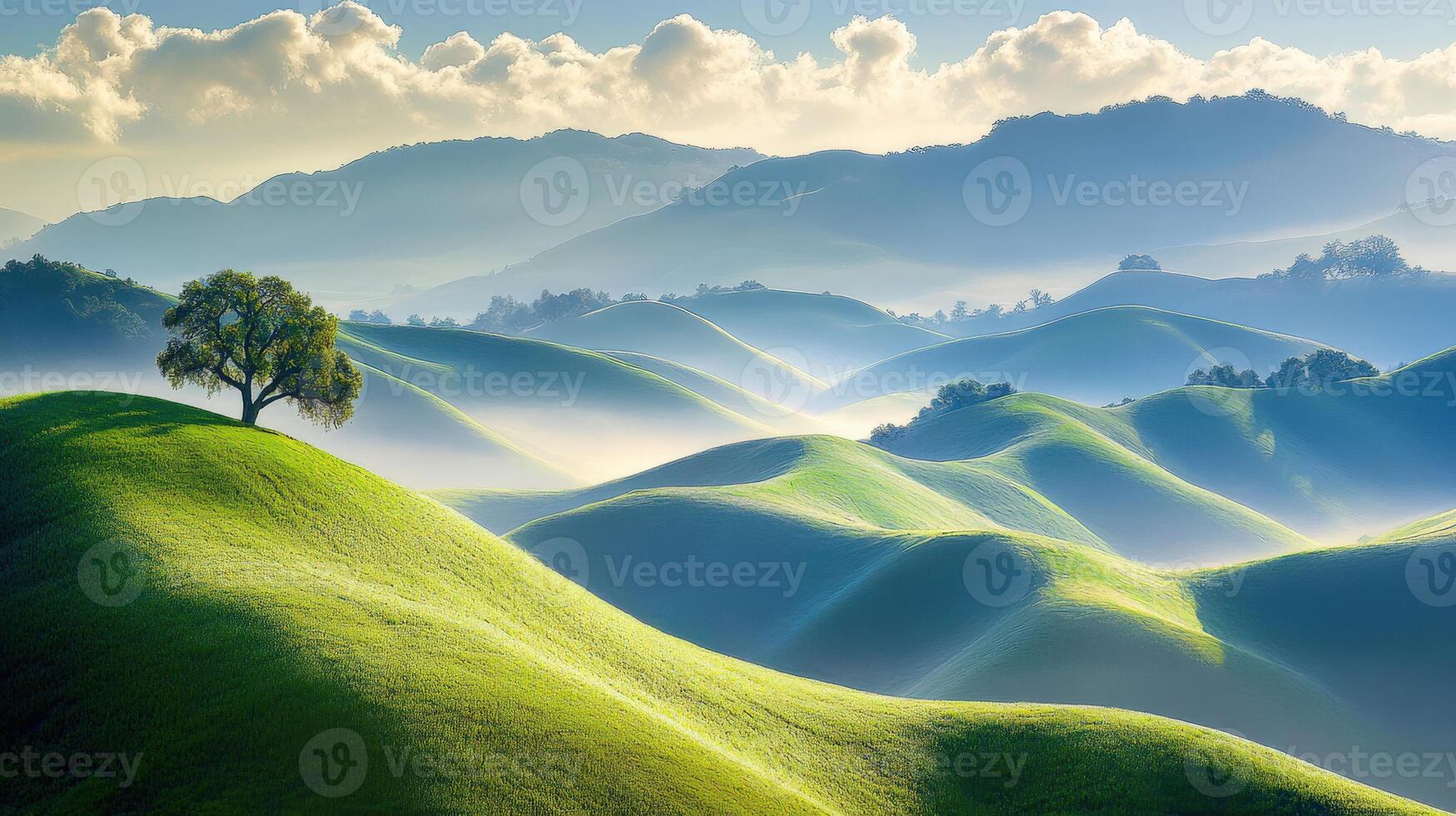 Lush green hills under a blue sky photo