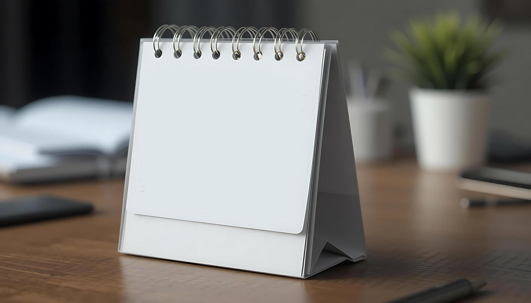 Desk calendar mockup blank on table. Blank paper desk spiral calendar. business planning and corporate design concept. white calendar photo