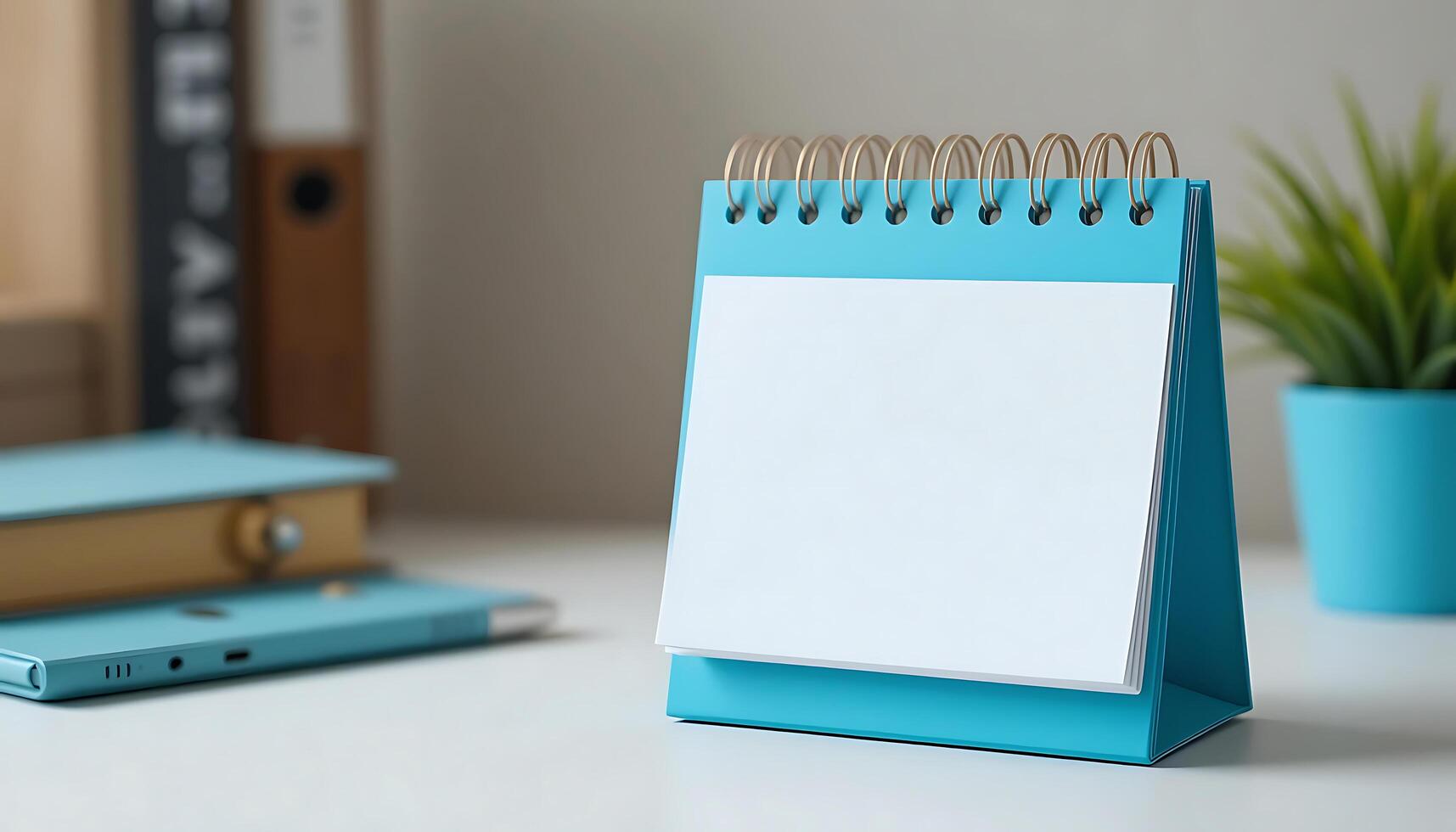 Desk calendar mockup blank on table. Blank paper desk spiral calendar. business planning and corporate design concept. blue calendar mockup photo