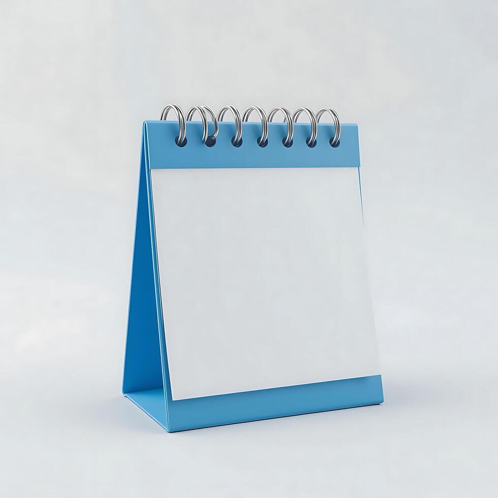 Desk calendar mockup blank on white background. Blank paper desk spiral calendar. business planning and corporate design concept. photo