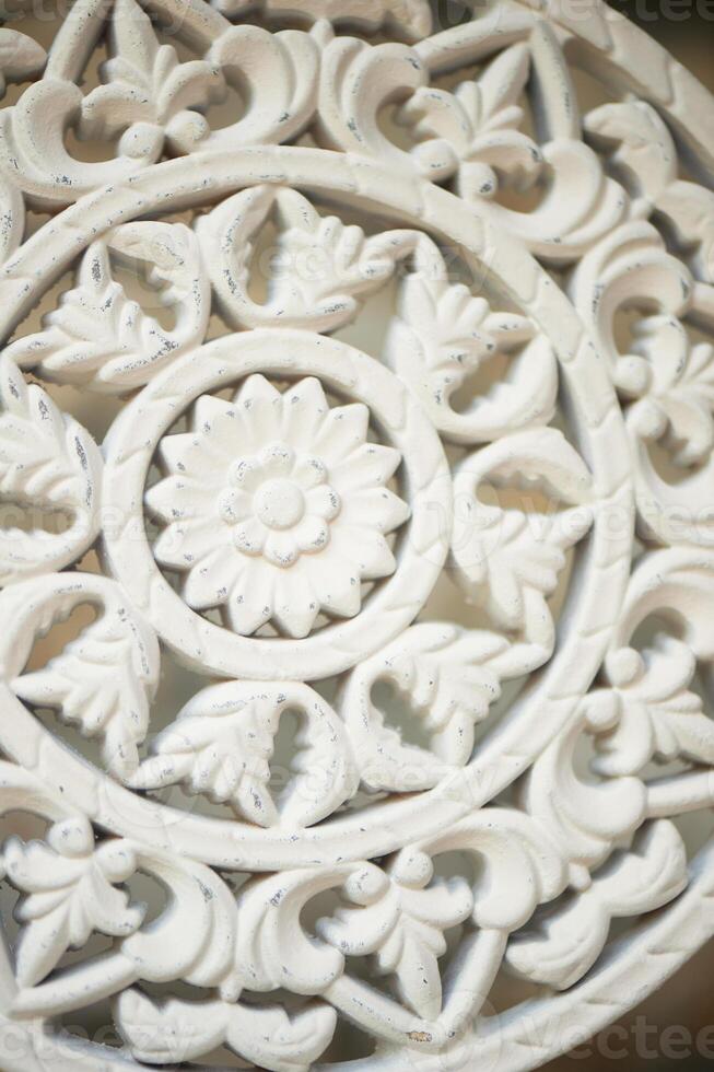 White plaster pattern. White ethnic d cor photo
