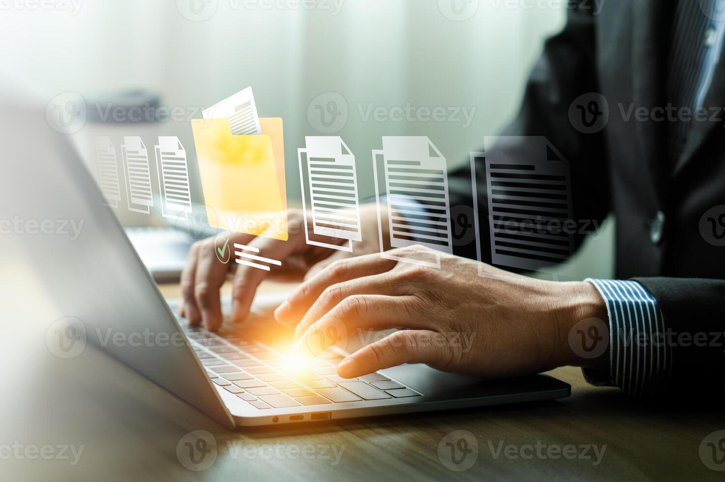 Businessman Organizing Digital Documents with Virtual File Management System on Laptop, Highlighting Efficient Workflow, Data Organization, and Modern Technology for Professional Productivity photo