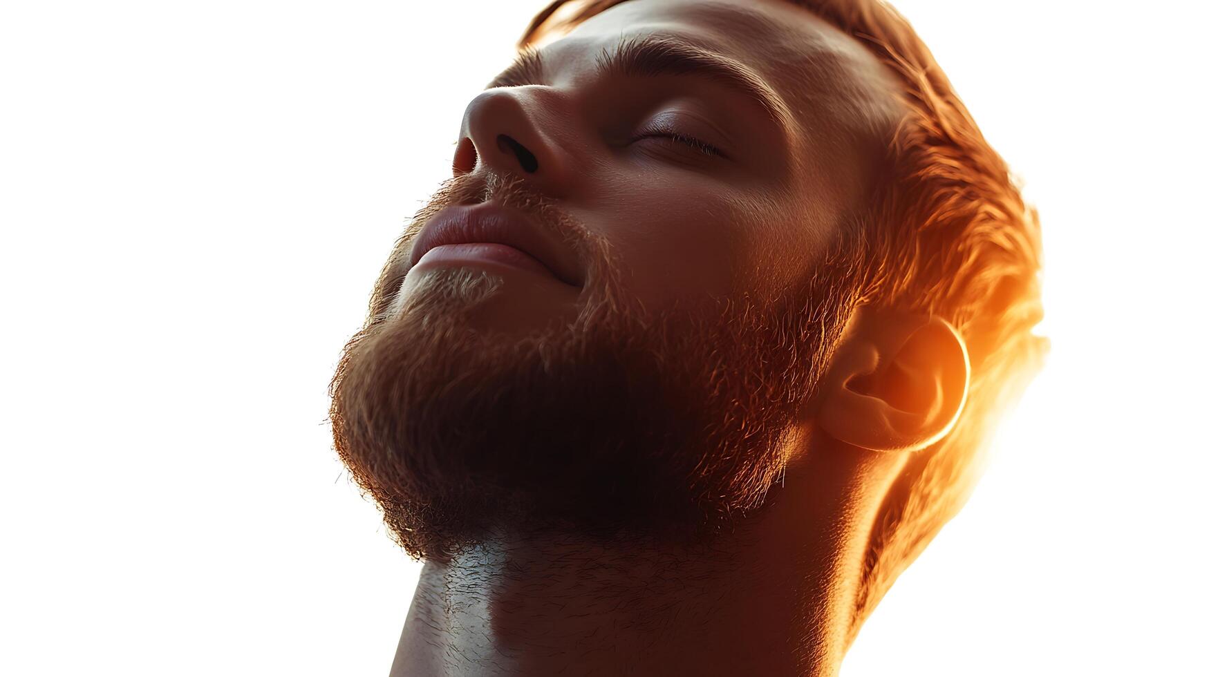 A close-up of a serene man with a beard eyes closed basking in the golden light capturing a moment of peaceful reflection photo