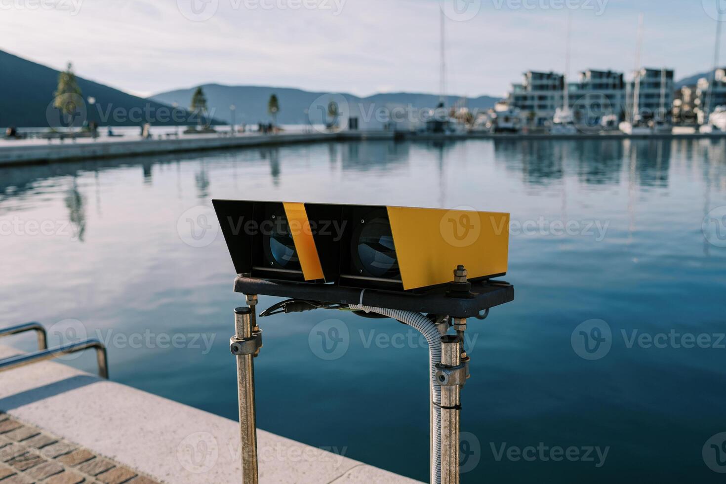 Observation deck on the shore with stationary observation binoculars photo