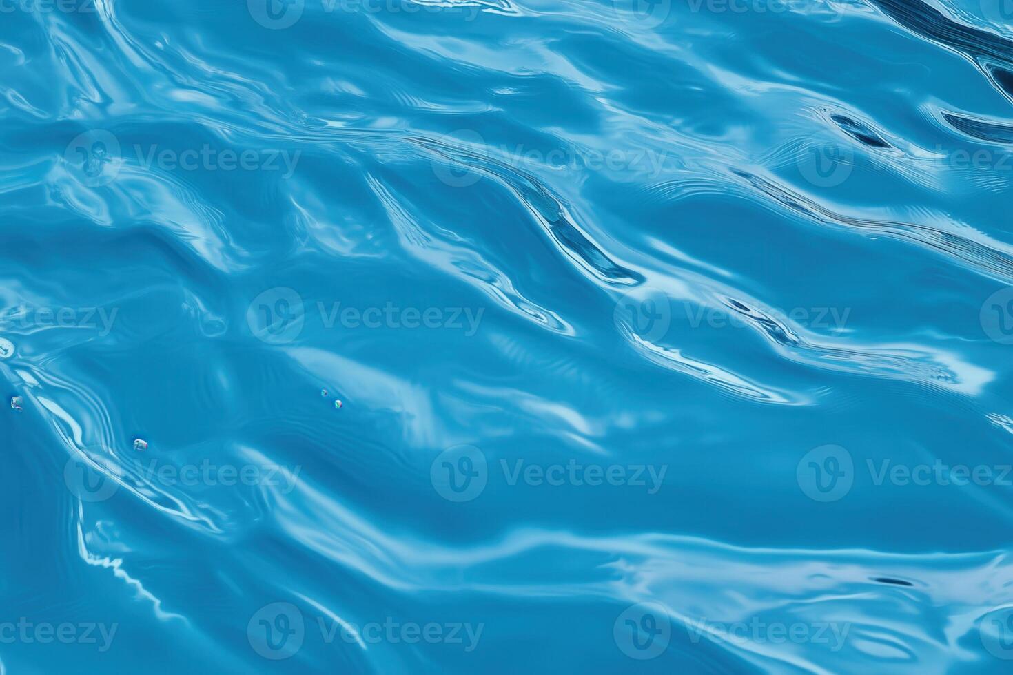 Experience the calming texture of turquoise water gently rippling in a mesmerizing close-up view. photo