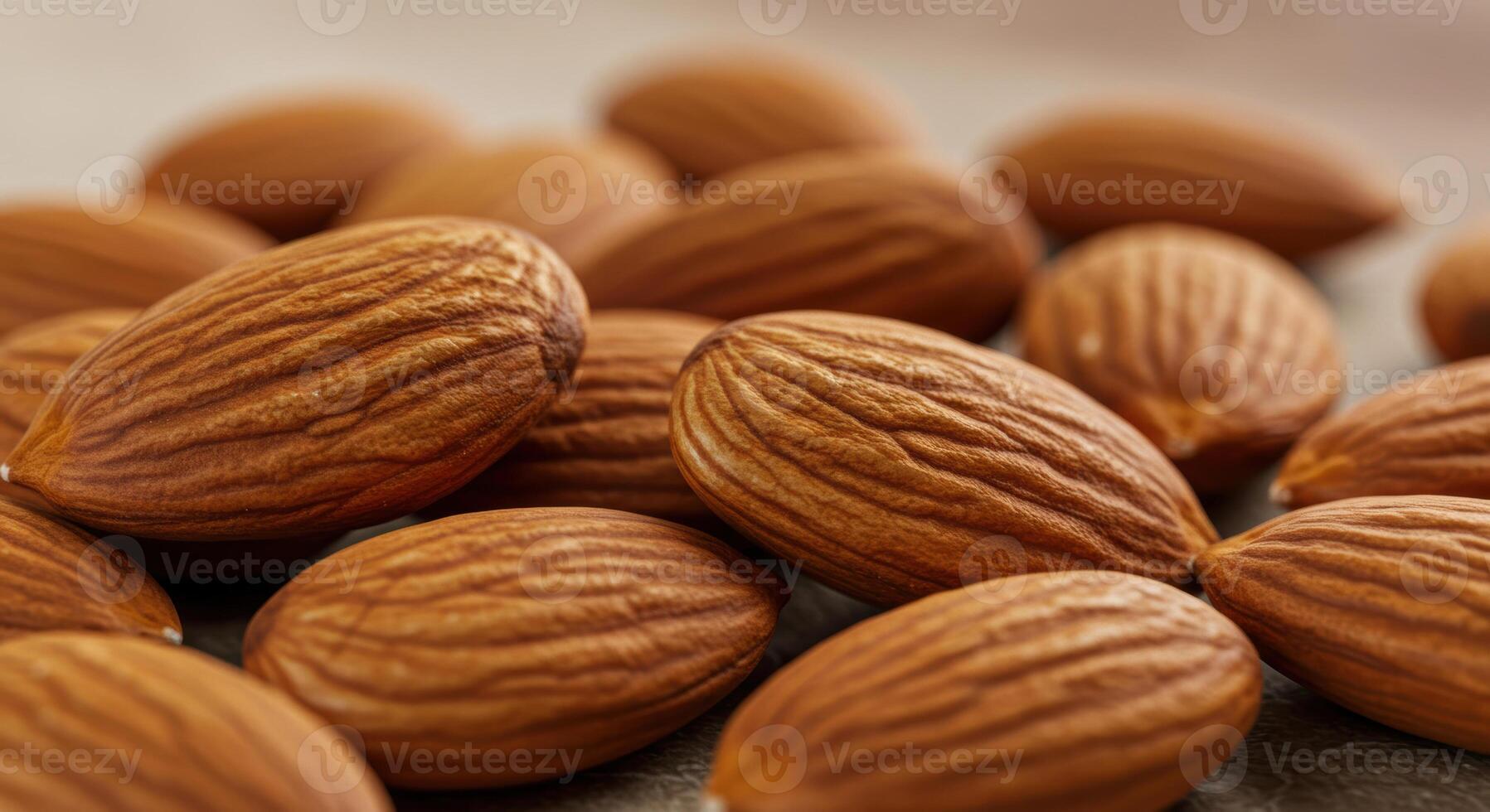 A beautiful close-up shows a pile of almonds, highlighting their natural texture and healthy benefits. photo