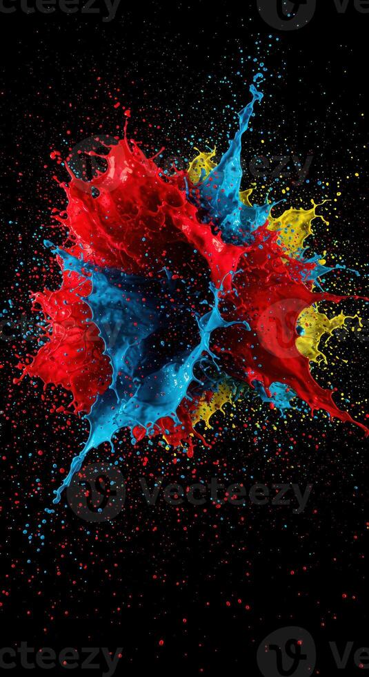 An explosion of vibrant red, blue, and yellow paint creates an energetic display. photo
