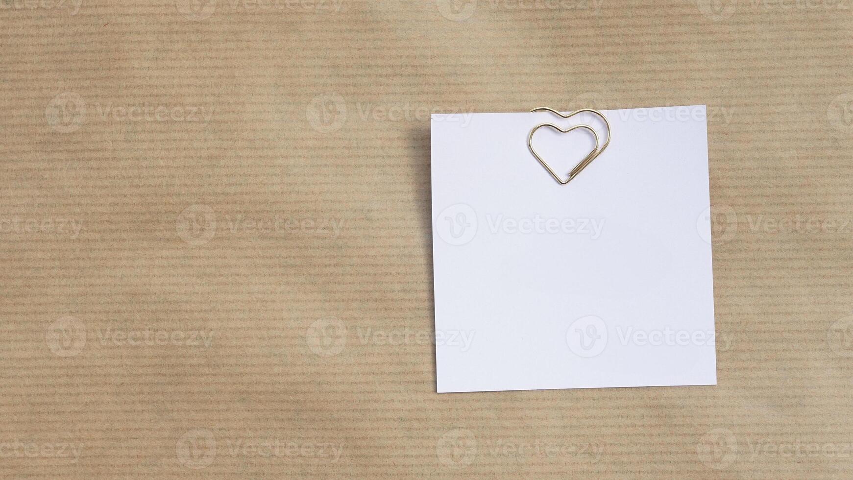 Blank white card mockup template on beige paper background. Top view. Modern trend template for advertising. photo