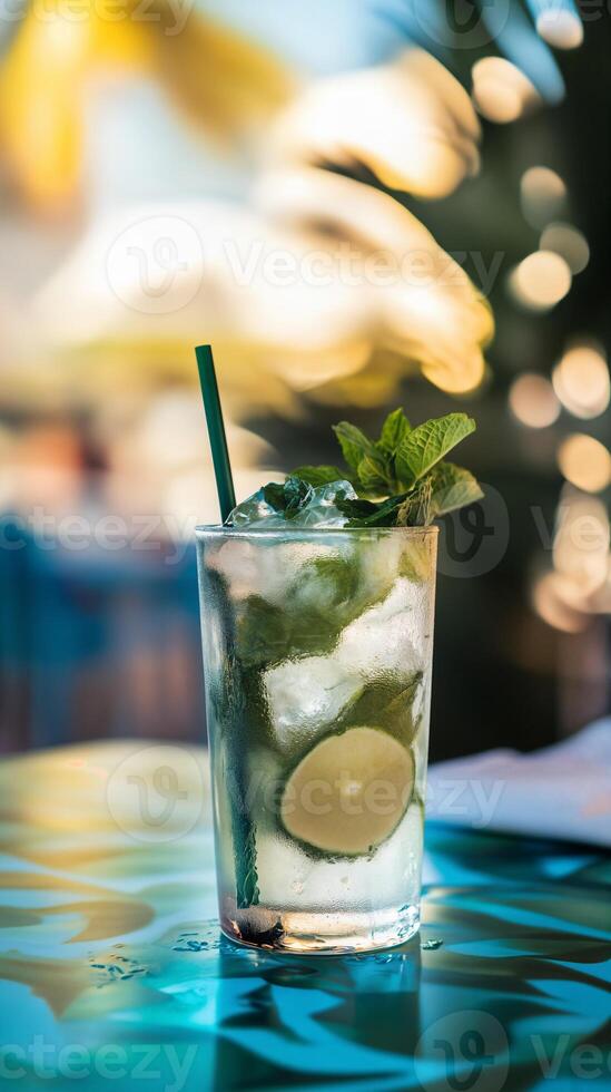 Refreshing Mojito with Mint and Lime Against a Vibrant Background photo