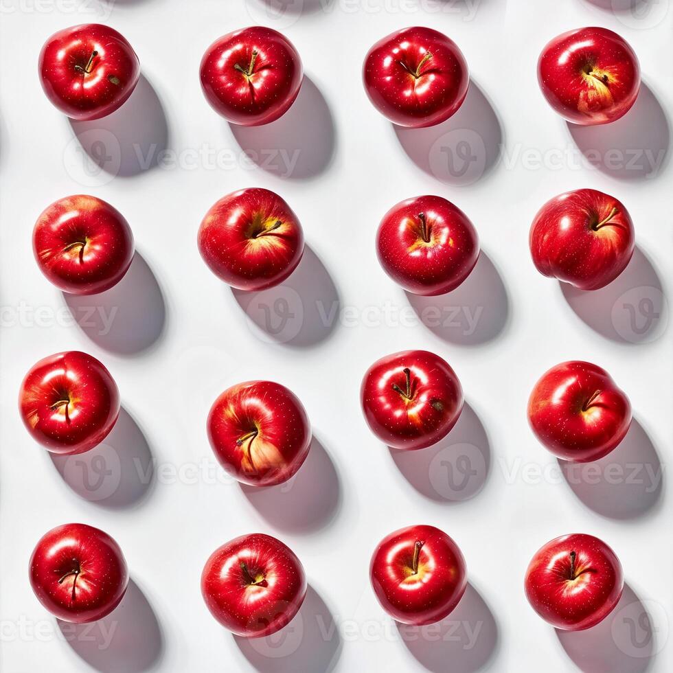 Fresh red apples arranged in a neat pattern photo