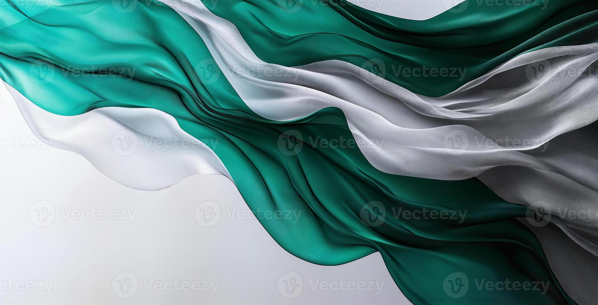 Elegant flowing fabric with shades of green and white creates a sense of movement photo