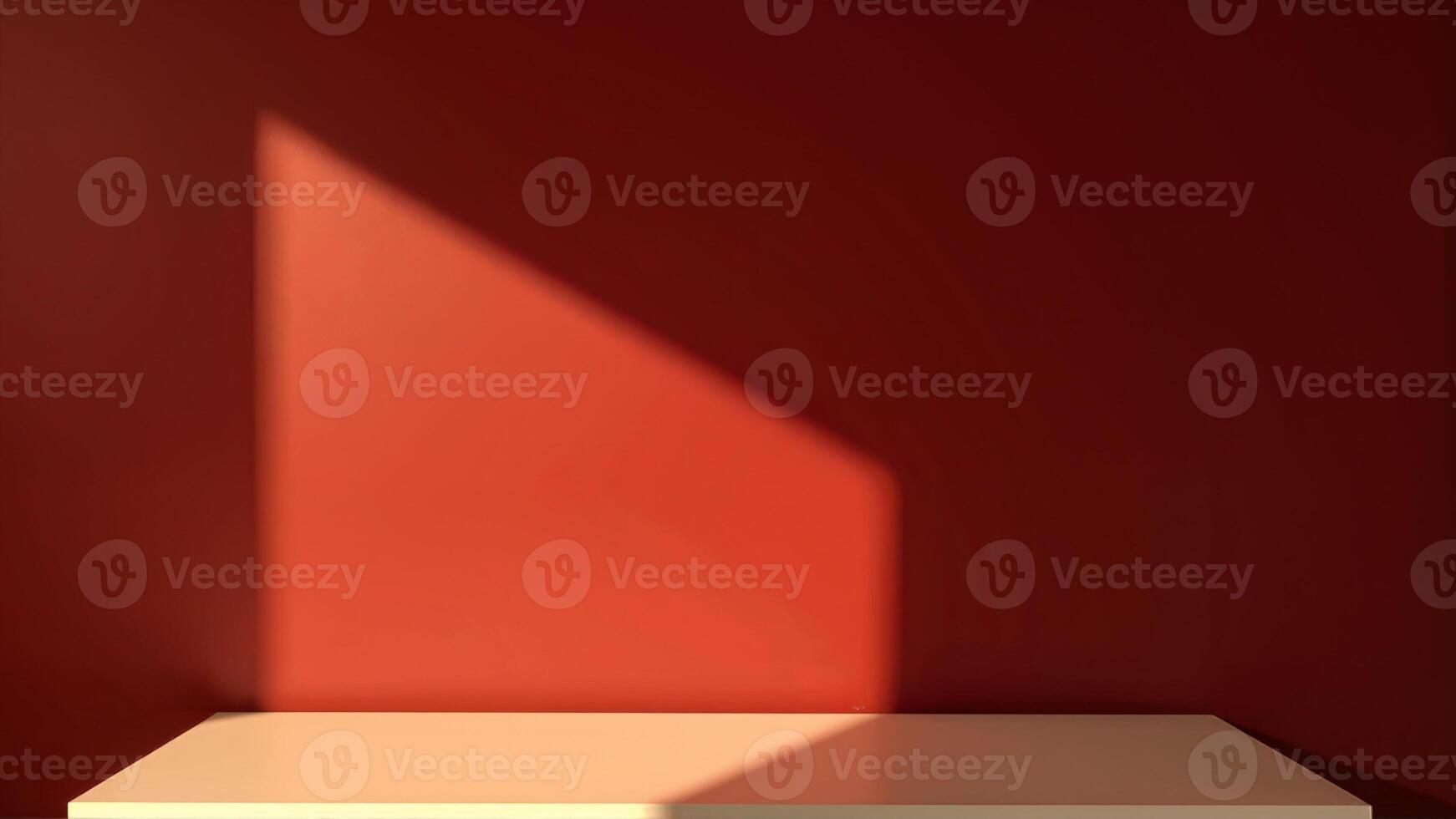 Soft Shadow on Warm Red Wall with Light Neutral Surface Below photo