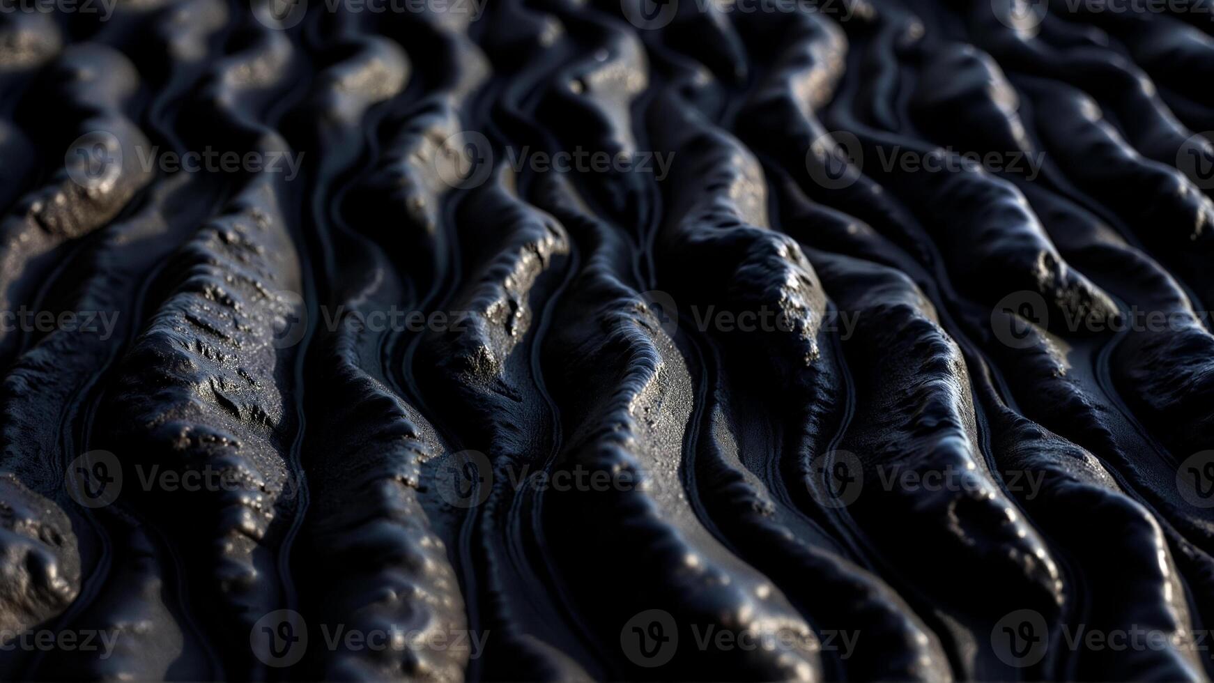 Textured Dark Surface with Flowing Patterns photo
