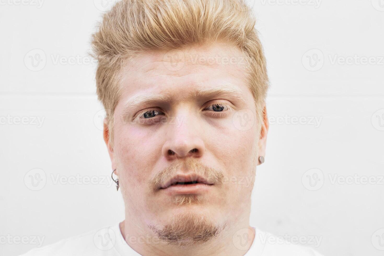 Close up portrait of an albino latino man photo