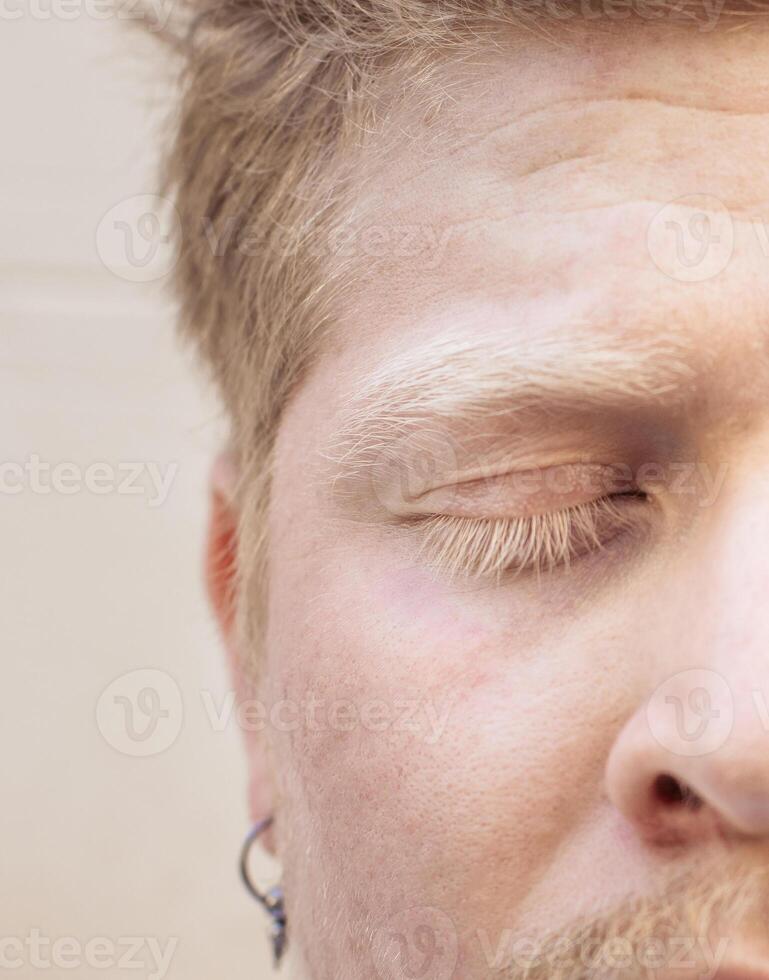 Close up portrait of an albino latino man photo