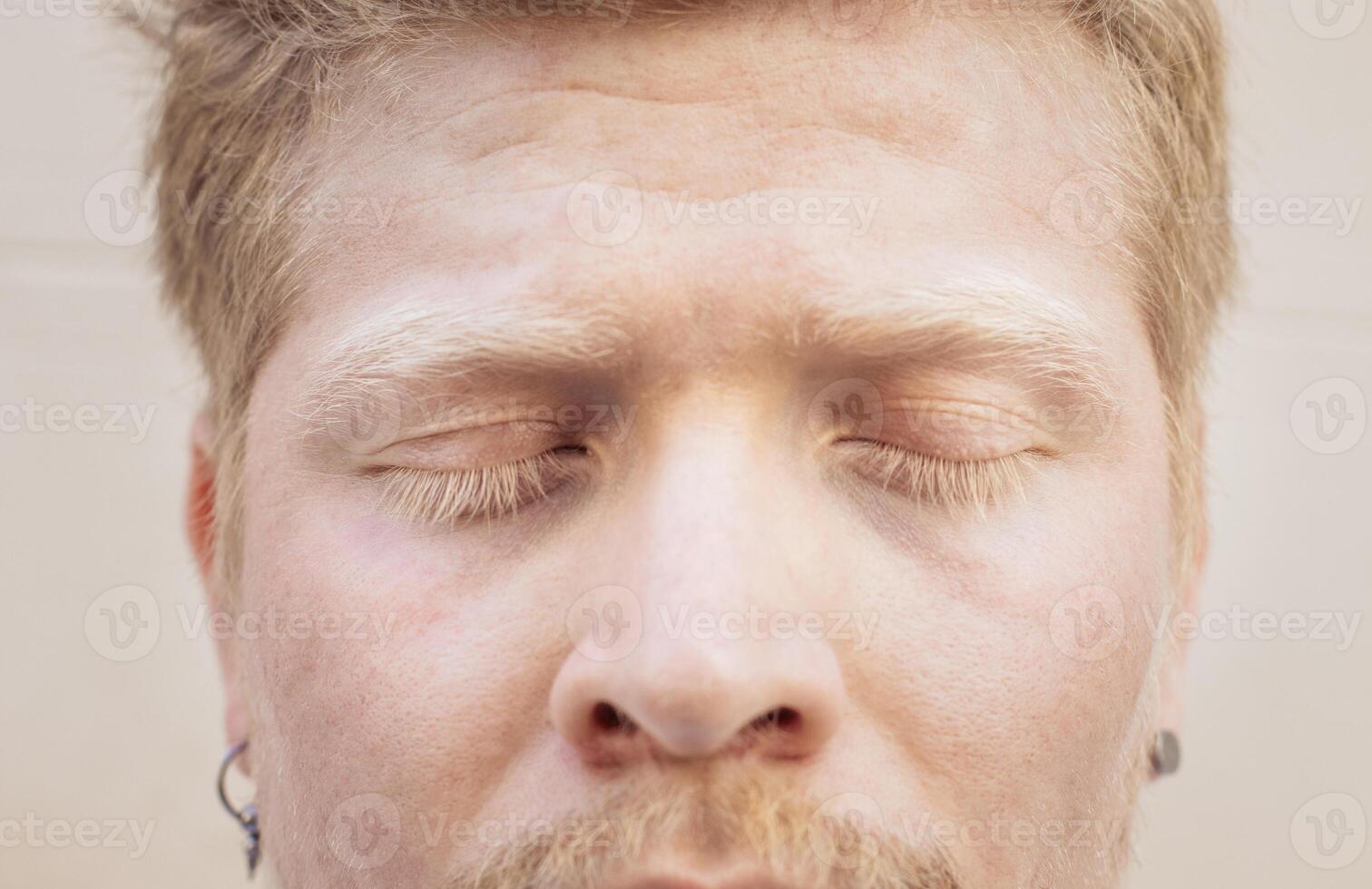 Close up portrait of an albino latino man photo