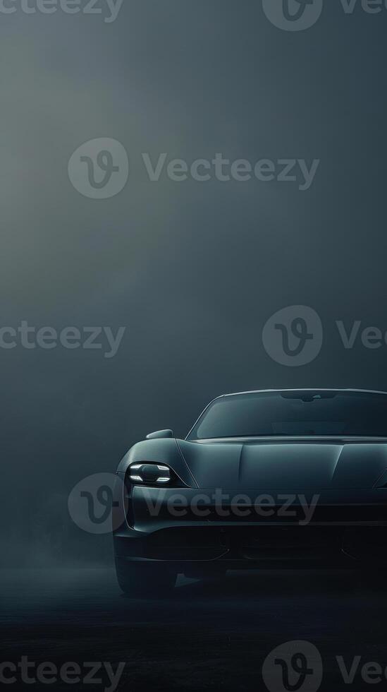 Sleek sports car cruising mysterious foggy road at dawn with headlights on photo