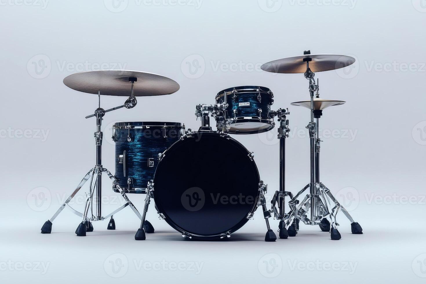 Blue drum set standing in a white room with cymbals ready to play photo