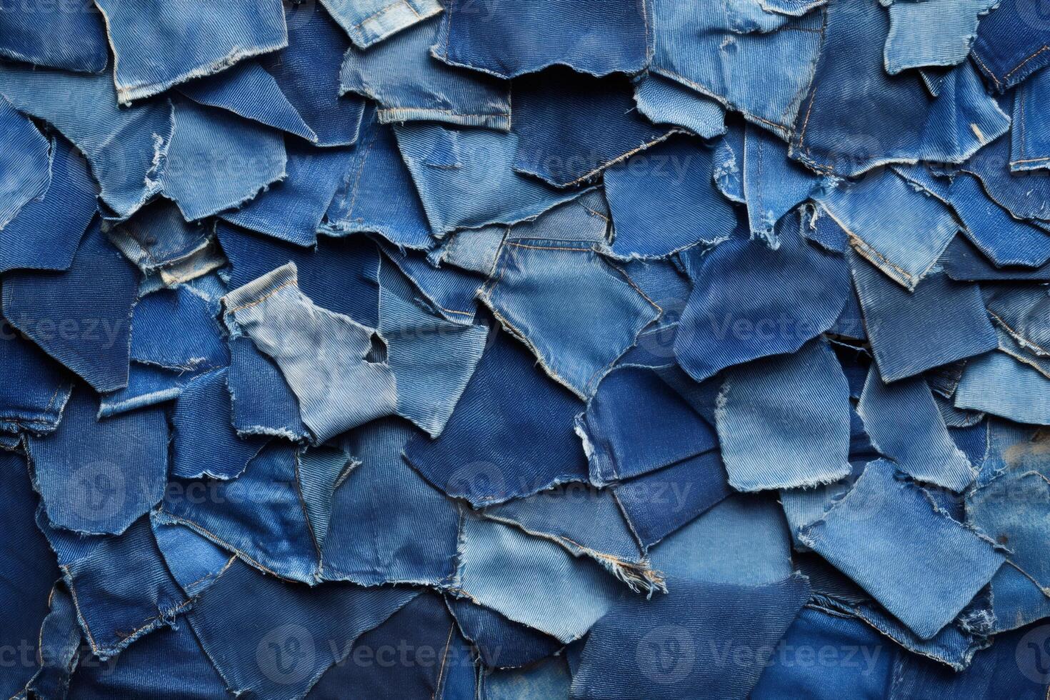 Denim scraps forming textured background, upcycled fashion and design concept photo