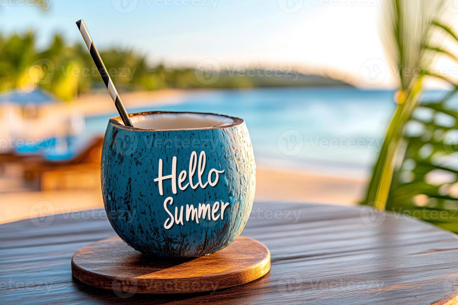 Coconut drink welcoming summer on tropical beach table photo