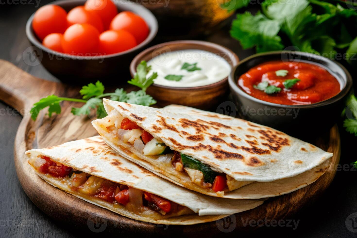 Delicious quesadillas with chicken and vegetables served on wooden board photo