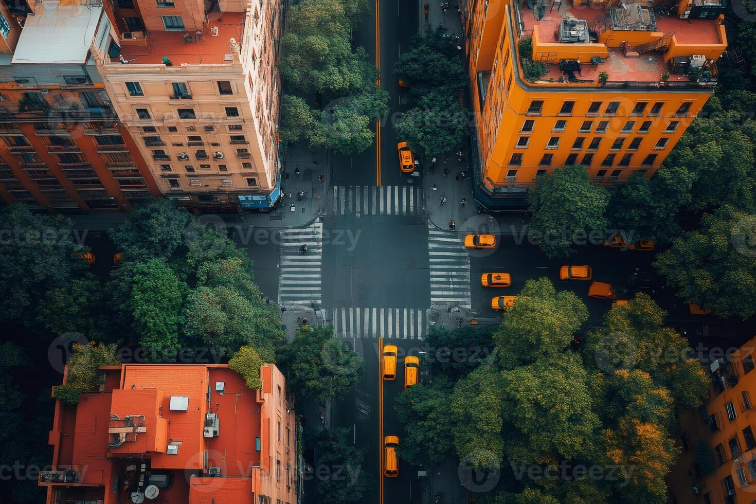 Yellow cabs passing through crossroad in new york city during the day photo