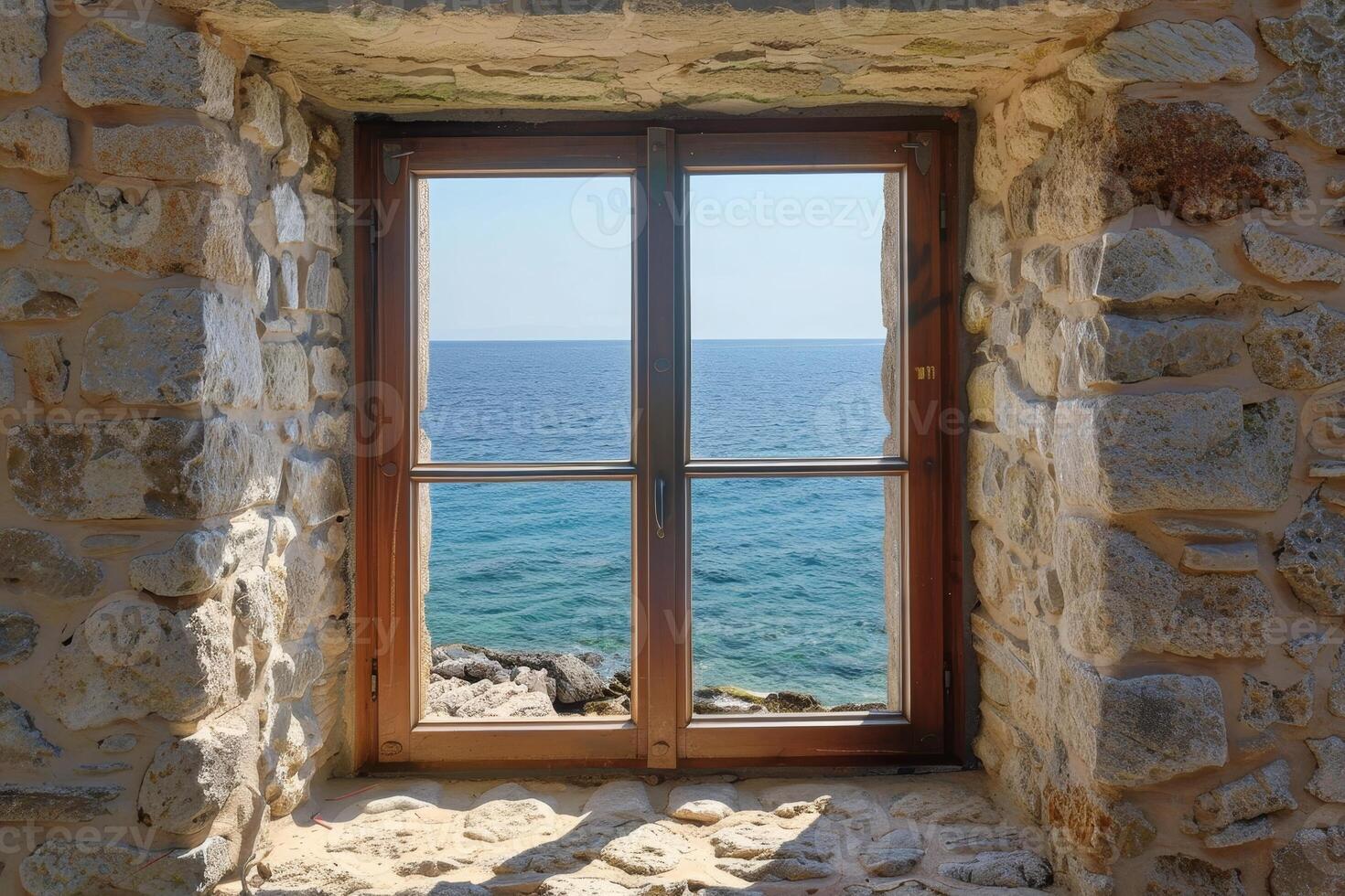 Serene ocean view through rustic stone window frame photo