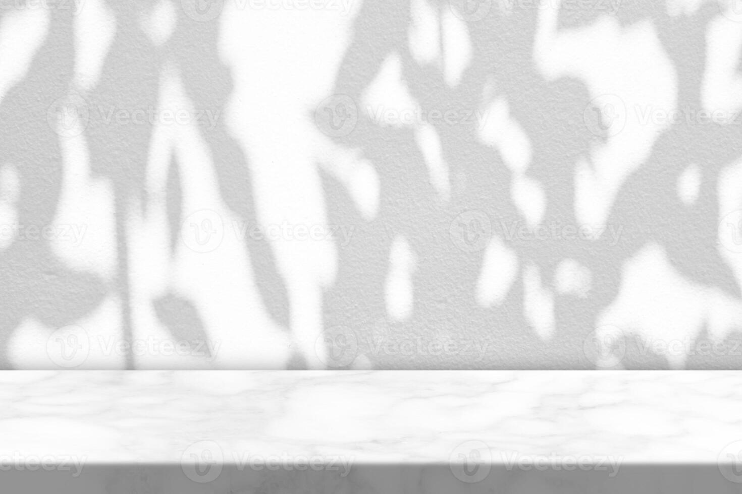 Marble Table with Tree Shadow on Concrete Wall Texture Background photo