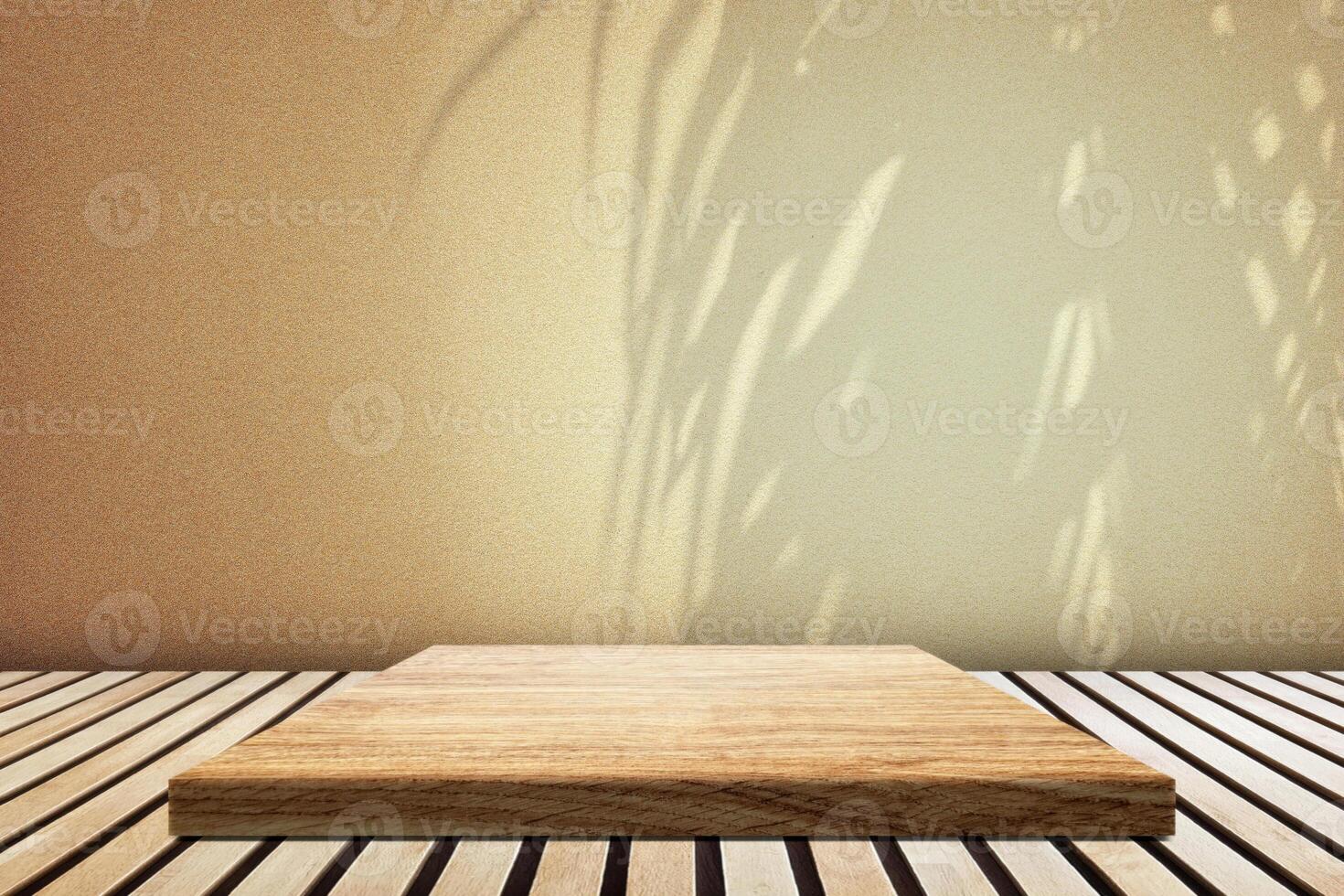 Minimal Wood Podium with Coconut Leaves on the Surface of Gold Concrete Wall Background photo