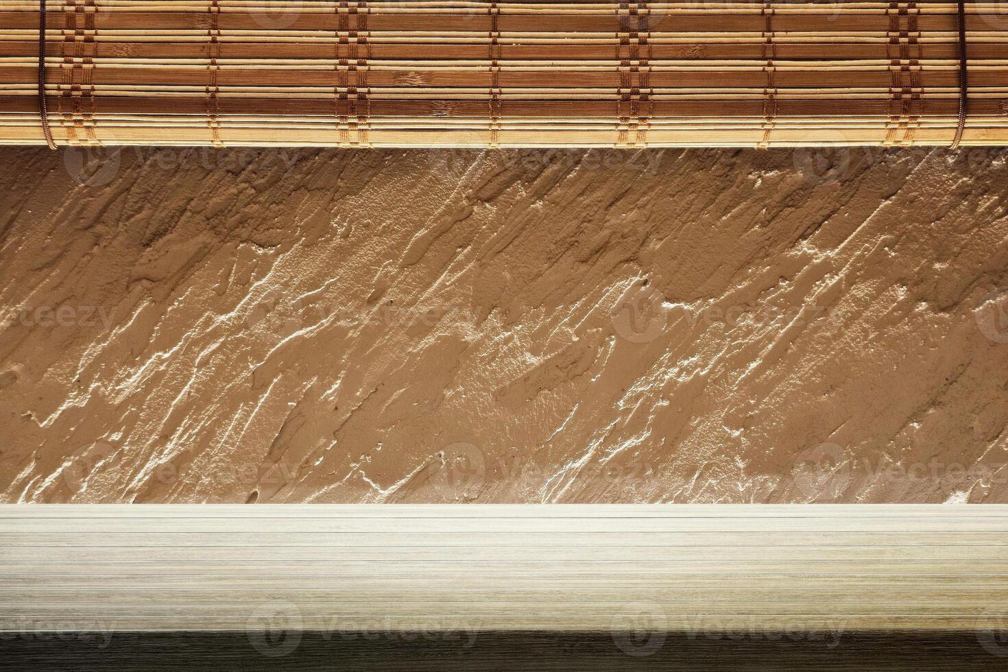 Minimal Table with Japanese Wooden Blinds and Rough Stucco Background photo