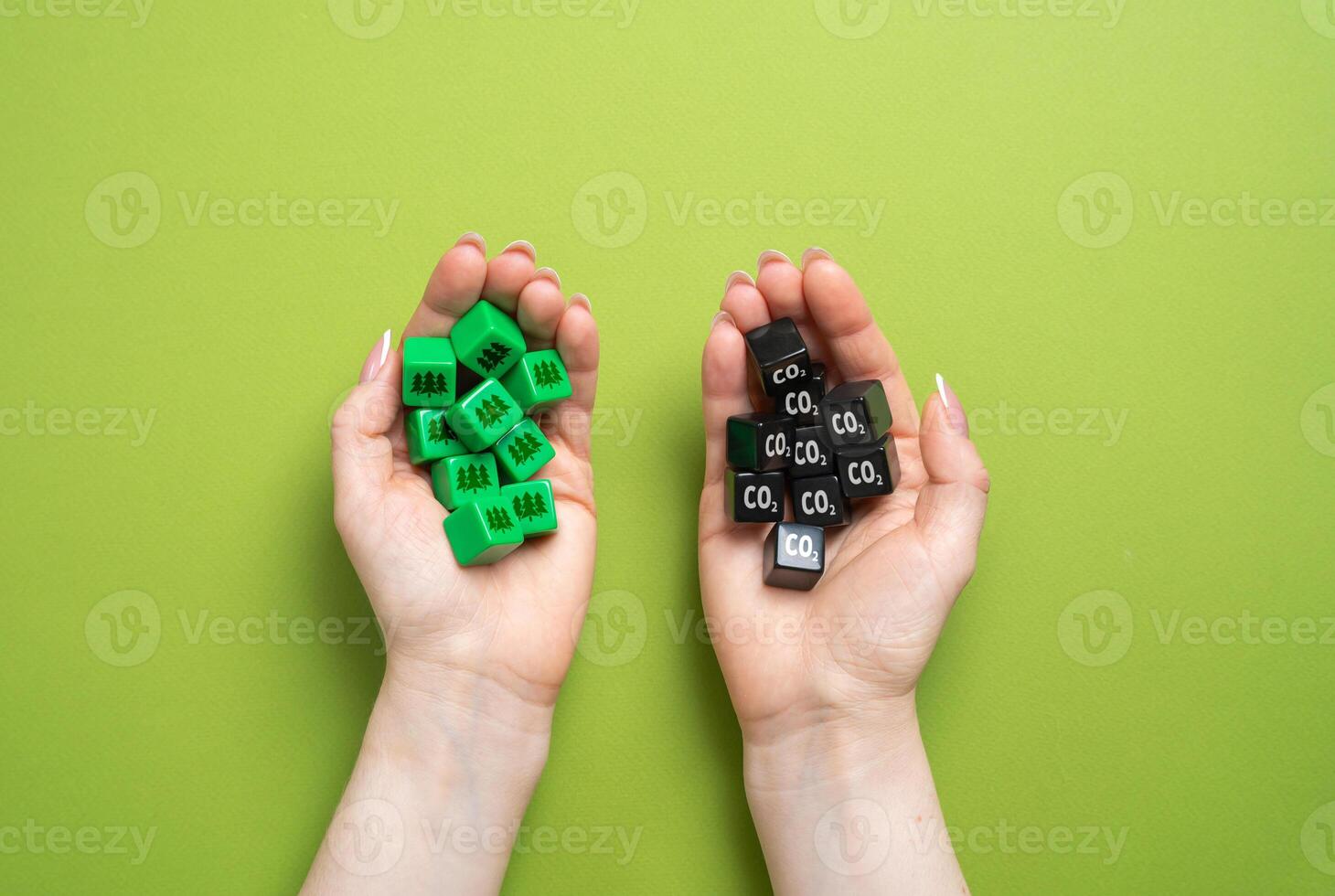 CO2 cubes and oxygen-restoring forests in hands. Compensation for human damage to nature. Carbon offsetting, reforestation programs, and nature conservation. Ecological balance, sustainability photo