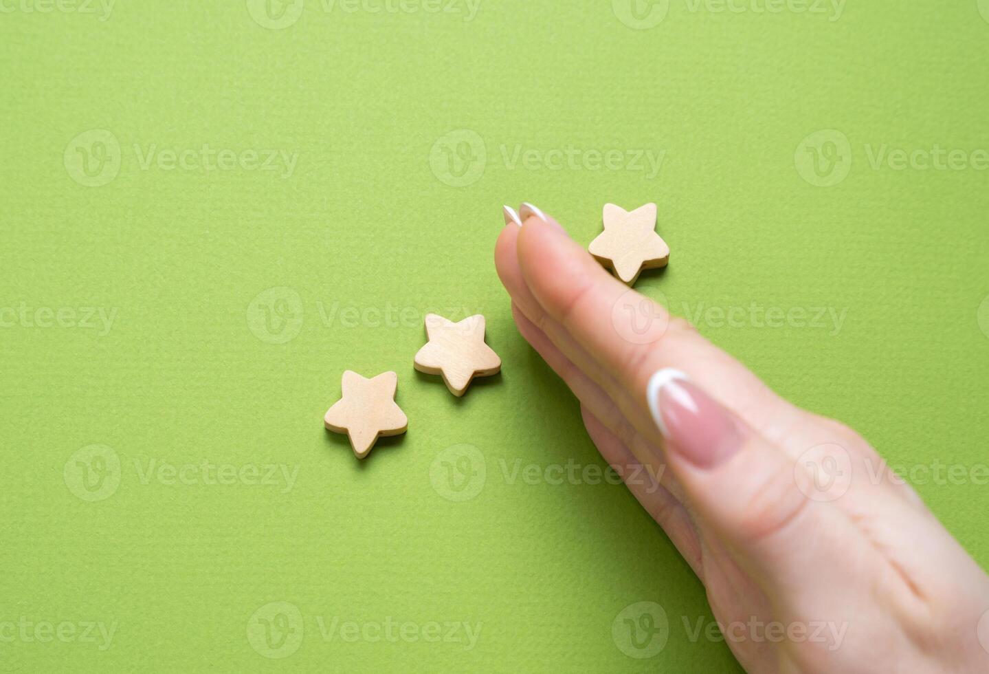 Loss of one star. From three stars to two. Dissatisfaction, declining quality, unmet expectations. Disappointment with product performance, service issues. photo